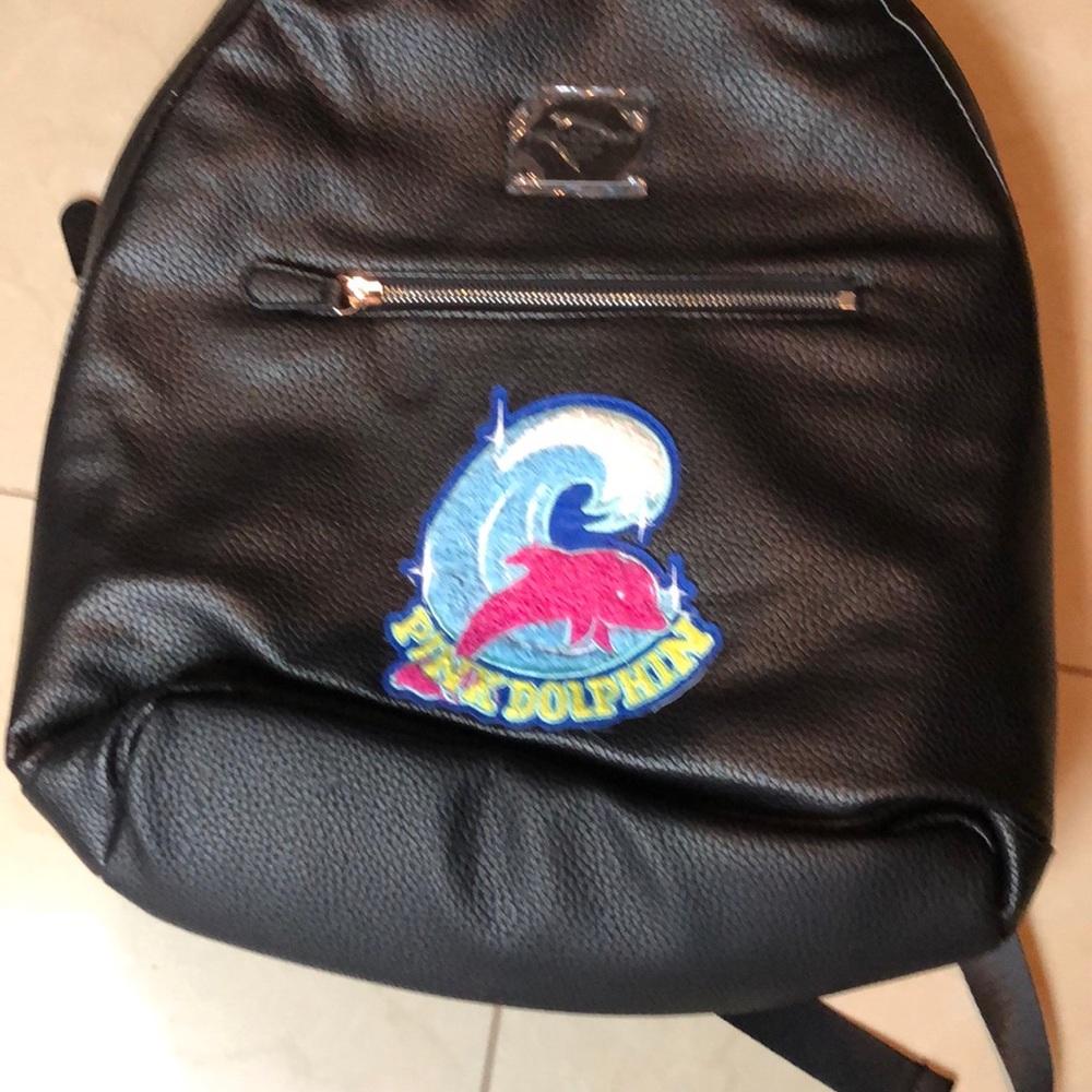 Pink dolphin book bag